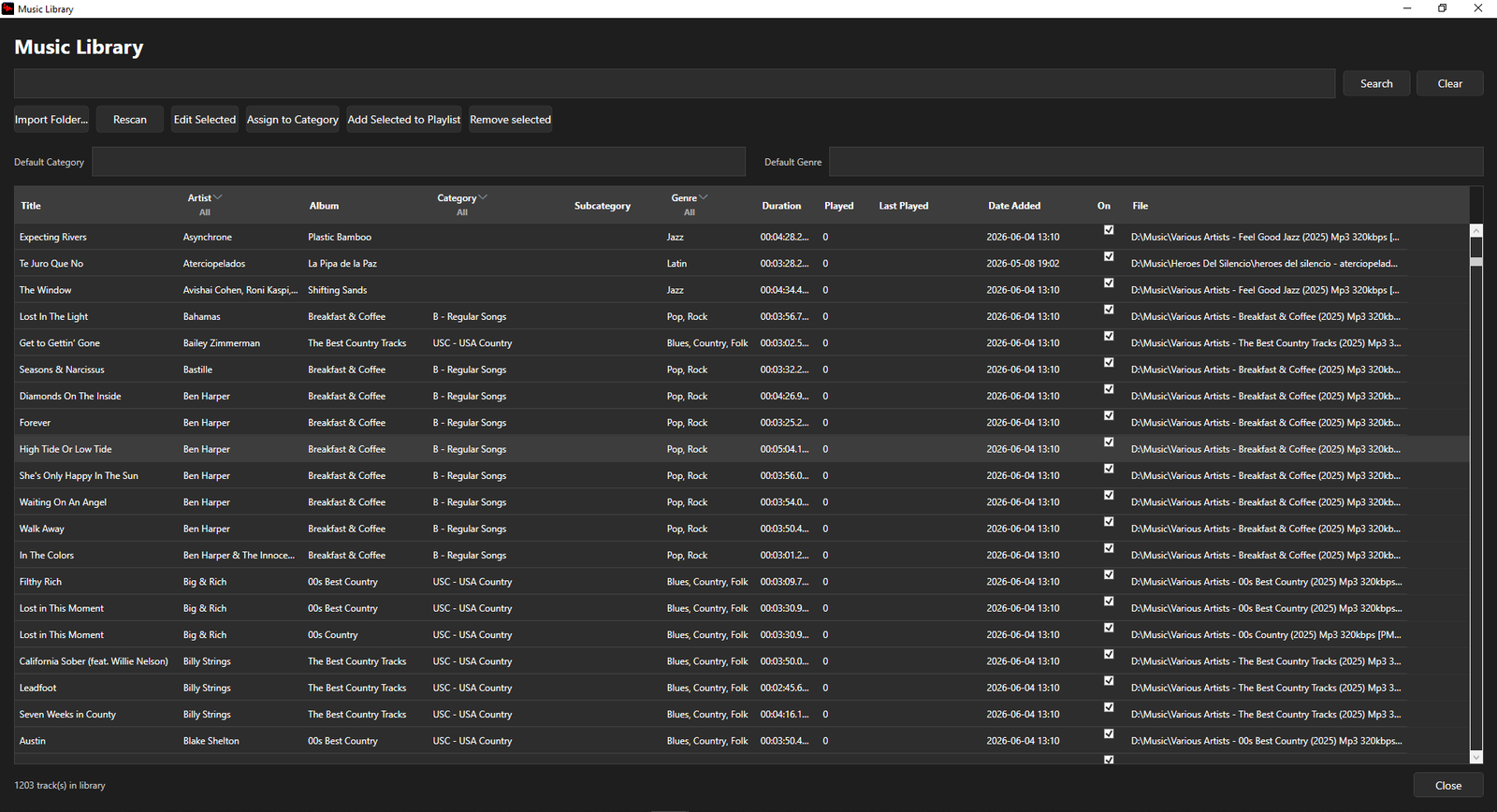 Music Library window listing 1,203 tracks with artist, album, category, genre, duration and play count columns
